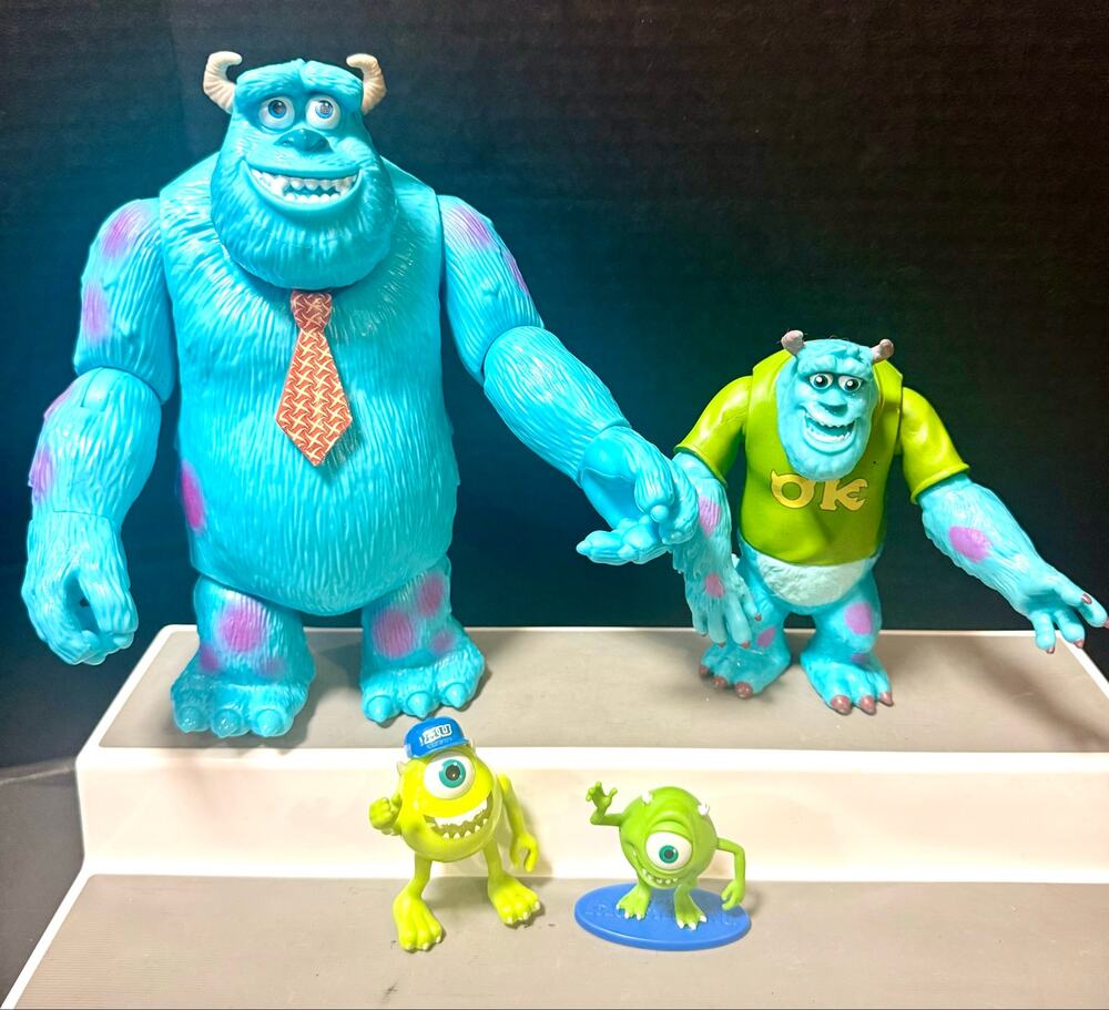 Disney Pixar Monsters, Inc & Monsters University figures Sulley Mike Wazowski.